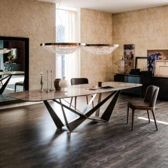Exceptional Cattelan Italia Skorpio table with light beige Marmi ceramic top and dark embossed lacquered steel base