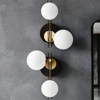Distinguished Cattelan Italia Planeta wall lamp with burnished steel and brushed brass accents, showcasing stacked satin white blown glass shades