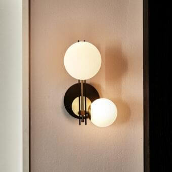 Exceptional Cattelan Italia Planeta wall lamp crafted with burnished steel and brushed brass, showcasing satin white glass shades with a matte black finish