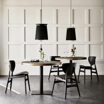 Distinguished Cattelan Italia Ribot Keramik table with Marmi Ardesia ceramic and brushed bronze-finished metal rim built with a black embossed lacquered steel base