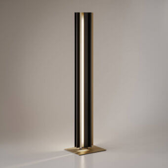 Sophisticated VENICEM Secret floor lamp crafted in light burnished brass and matt black metal with a contemporary directed illumination