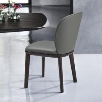 Harmonious Cattelan Italia Chris chair with natural ashwood base and muted grey-green fabric upholstery and satin finish