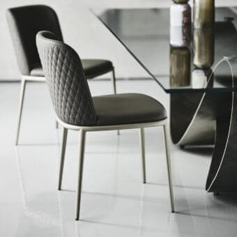 Exceptional Cattelan Italia Magda ML Couture chair upholstered in dark gray diamond-quilted leather with brushed metal legs
