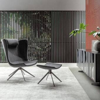 Captivating Bonaldo Colibrì lounge chair with gray textile upholstery and a slender matt painted metal base