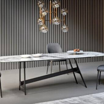 Distinguished Bonaldo Mida chair with a sleek silhouette and sophisticated gray textile upholstery with matte black metal legs