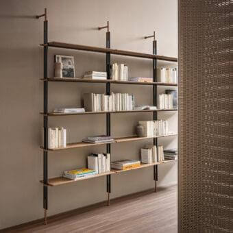 Distinguished Bonaldo Roll bookcase crafted in light brown wood with a dark brown metal frame and copper accents