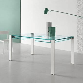 Distinguished Tonelli Design Livingstone table with clear glass tabletop and matte white metal legs built with a stainless steel zipper mechanism