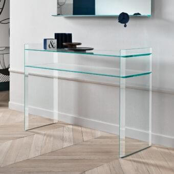 Elegant Tonelli Design Quiller console crafted in completely extra clear glass with stylish bevelings highlighting geometric lines