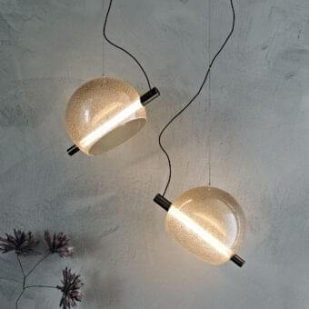 Refined Cattelan Italia Cody suspension lamp with artistic blown glass and illuminated steel cylinder in black chrome finish