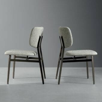 Refined Bonaldo Noor chair with light gray woven fabric upholstery and a dark bronze matte steel structure