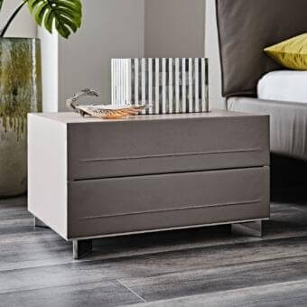 Refined Cattelan Italia Dyno nightstand with muted synthetic material and metal legs built with a push-to-open mechanism
