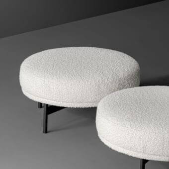 Superior Bonaldo Neuilly ottoman with textured off-white upholstery and slender matte black metal base