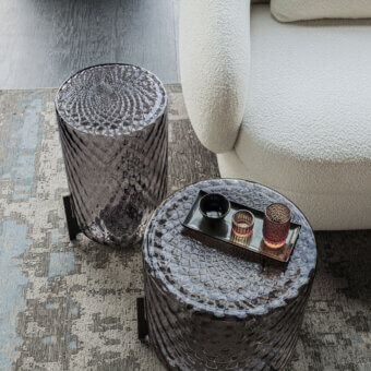 Captivating Cattelan Italia Dodo side table crafted in smoked crystal glass with a glossy finish and sharp legs