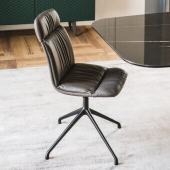 Exceptional Cattelan Italia Kelly chair with dark gray leather, hand-sewn pleats and a slender aluminum base