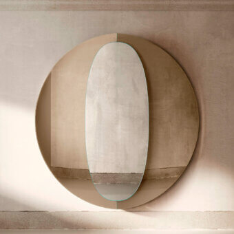 Distinguished Tonelli Design Central mirror with warm beige textured base and delicate teal accents in reflective glass