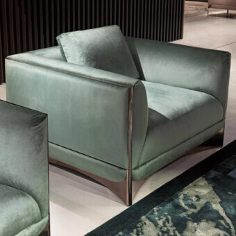 Captivating Visionnaire Ca’ Foscari lounge chair with plush grayish-green velvet upholstery and polished stainless steel base
