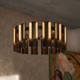 Exclusive Visionnaire Polaris chandelier crafted in curved aluminum with bronze and gold-toned panels and adjustable steel cables