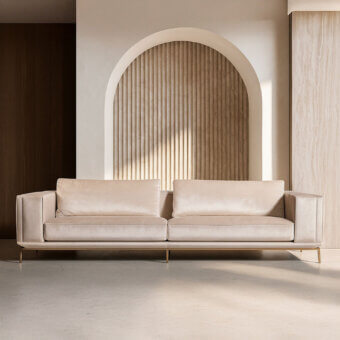 Superior Visionnaire Denzel sofa with muted beige textile upholstery and satin stainless steel base crafted for tailored support