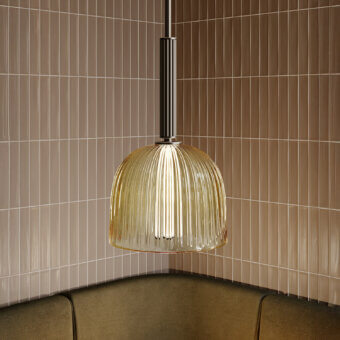 Distinguished VENICEM Augusta suspension lamp with wavy Murano blown glass and vertically grooved brass rod crafted in warm amber with satin metal