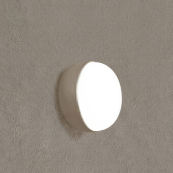 Elegant Contardi Kiki wall lamp in neutral beige with white opal glass and subtly textured matte finish