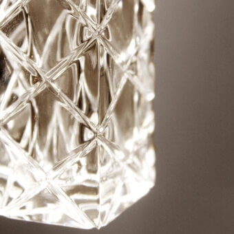 Distinguished Contardi Mikado suspension lamp with rectangular brass tubes and precisely engraved clear crystal cubes with a glossy finish