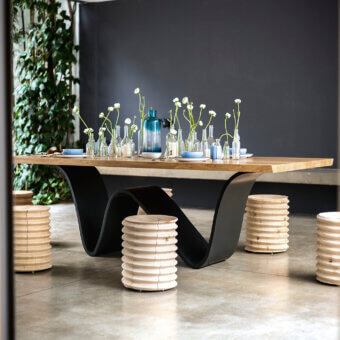 Superior Riva 1920 Bree e Onda table with warm brown visibly grained wood and dark gray matte sculptural metal base