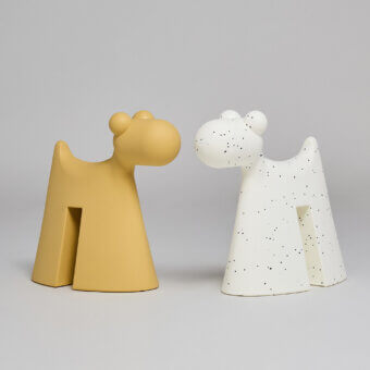 Distinctive Serralunga Doggy sculpture crafted in mustard yellow LLDPE with a smooth matte finish