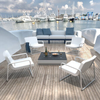 Elegant Serralunga Timeout lounge chair with a gently curved form crafted in durable matte white LLDPE material