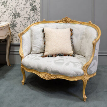 Premium Bellotti Ezio chair with carved wooden frame finished in patinated gold leaf, silver satin upholstery, Rococo silhouette