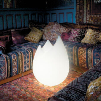 Captivating Serralunga Flame floor lamp sculpted from bright white LLDPE with a smooth matte finish casts ambient light