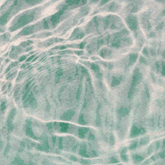 Superior Wall&Decò Reflex wallpaper showcases a wave-like pattern in grayish-green with swirling accents and a waterproof finish