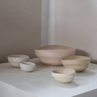 Distinguished Rina Menardi Noci vase crafted in Italy with gently curved forms and a smooth matte finish in neutral beige tones