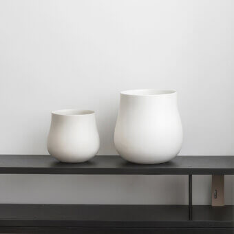 Distinguished Rina Menardi Delos vase crafted from baked clay in Italy with smooth matte ceramic and organic silhouette
