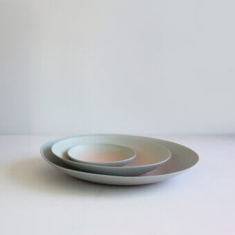 Distinguished Rina Menardi Gusci Shells centerpiece crafted in pale green-grey with a smooth matte finish and gently curved forms