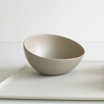 Distinguished Rina Menardi Nidi vase crafted in Italy with muted gray ceramic and seamless matte finish