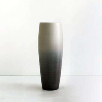 Superior Rina Menardi Vasi Ovali vase crafted in Italy with a gradient from light to dark gray and satin finish