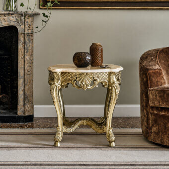 Luxury Bellotti Ezio side table with honey onyx marble top and gilded SG Silver Gold base featuring cabriole legs and Baroque leaf and shell motifs