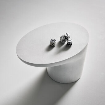 Elegant Bonaldo Sloan coffee table with mineral white concrete‑effect matte finish in high‑density polyurethane
