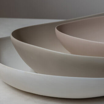 Elegant Rina Menardi Conche Centerpiece set of baked clay bowls in off‑white, taupe beige, dusty rose with matte satin finish