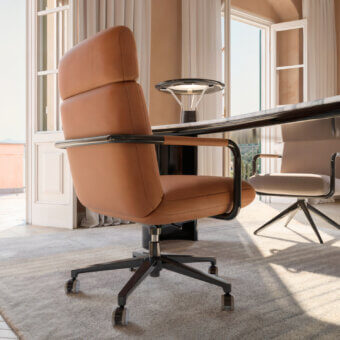 Elegant CPRN Homood Barry Swivel Armchair with tan leather high back silhouette matte dark metal base black frame