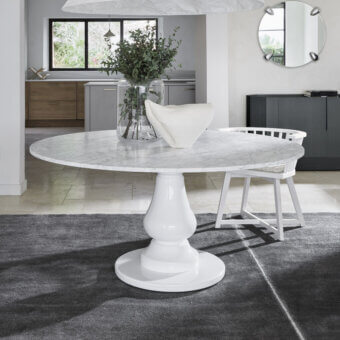 Sophisticated Gervasoni Gray 38 Round Table crafted in white Carrara marble and curved Millgres central base