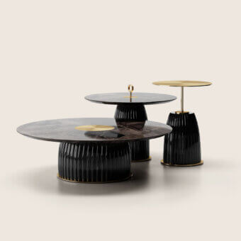 Exquisite Paolo Castelli Dione side table featuring a cylindrical gres base, white Carrara marble top, and brushed matt gold metal…