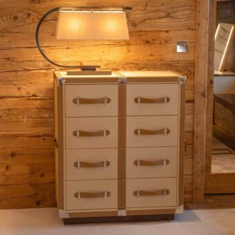Distinguished Vèlle Milano Dora Chest of Drawers Trunk in beige tan leather with silver-toned metal and dark wood base