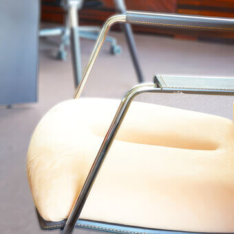 Exquisite Codutti Genesis Soft office armchair featuring cream leather upholstery and glossy aluminum armrests
