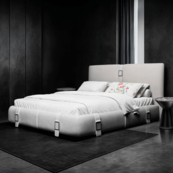 Luxury JR Home by John Richmond bed featuring off-white fabric upholstery alongside nickel black antique metallic buckle frames