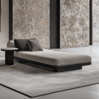 Sumptuous JR Home John Richmond chaise lounge in light textured textile with cylindrical bolster and Nero Titanio base