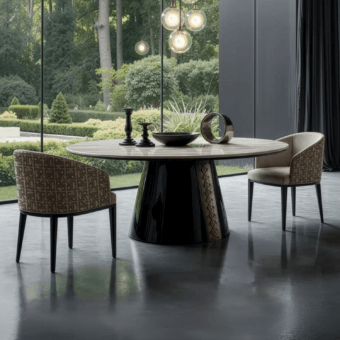 Luxurious JR Home by John Richmond armchair featuring curved tub shell upholstered in light-beige fabric