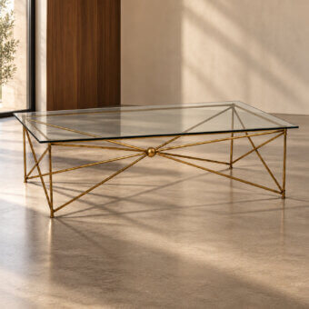 Exquisite Selezioni Domus Filo coffee table showcasing clear glass top over warm golden yellow metal framework
